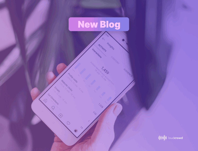 A smartphone displaying social media analytics with a bar chart showing weekly interactions, held by a hand against a vibrant purple and pink gradient background, with a 'New Blog' banner highlighting the announcement."
